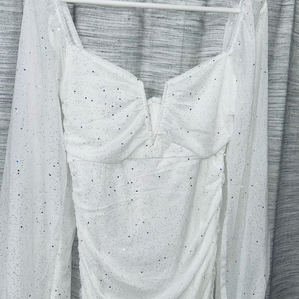 White long sleeve boutique dress size medium flattering fit